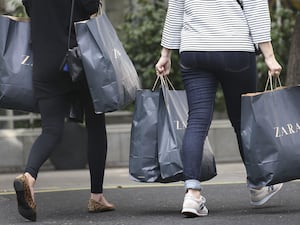 People carrying shopping bags