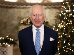 The King during the recording of his Christmas message at the Fitzrovia Chapel in central London