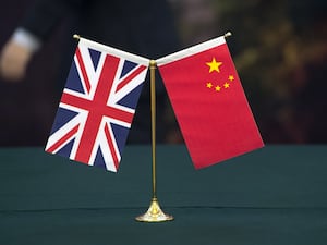 The Union flag and the flag of the People’s Republic of China