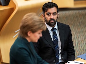 Nicola Sturgeon speaking in Holyrood with Humza Yousaf seated beside her