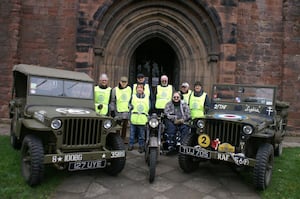 Caption: Members of Shrewsbury Severn Rotary Club backing up the militaria display outside the Abbey Church.