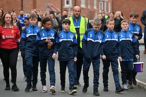 In the red Liverpool FC shirts are Mom and Dad: Kate and Chris Turton and in NC training kit is there other son: Ben Turton 11. With them also in his black Liverpool FC top is the boys cousin: Harry Ellis 16. Members of NC United joined them on the walk. 