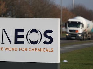 An Ineos sign with a tanker wagon in the background