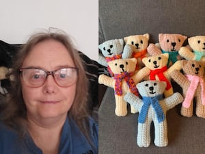 Woman next to bears