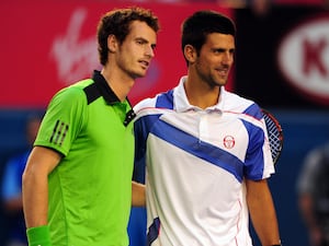 Andy Murray, left, and Novak Djokovic pose for photos before the 2011 Australian Open final