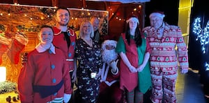 Some of the organisers and helpers including Builth Wells Mayor Councillor Gwyn Davies and his partner Lisa on the far right, Santa and town clerk Louise Hammond in the centre.