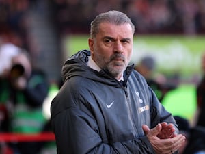 Ange Postecoglou applauds during the game at Brentford