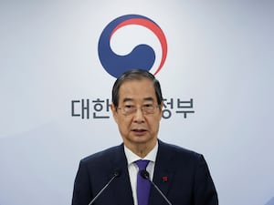 South Korea’s acting president, Han Duck-soo, speaks at the government complex in Seoul