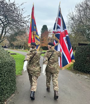 Jess Berry and Maisie Jones taking part in Remembrance 