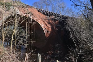 The landslide on the Severn Valley Railway, near to the Astbury Gold Course and Bridgnorth. Half of the edging stones on a bridge have gone aswel as the land. On some pics is local worker: Alex Stevens, he saw the landslide and was the one that called it in to the railway.