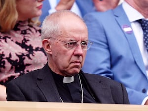 Justin Welby at Wimbledon looking glum