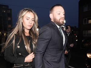 Conor McGregor and partner Dee Devlin arrive back at the High Court in Dublin