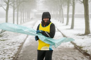 Tim Stevens celebrates after finishing his marathon challenge. Picture: Jamie Ricketts