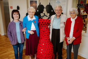 Beautiful poppy dress created by Shifnal Residents Complex ahead of Remembrance Day. In picture: Annie Armitage, Eileen Dowsett, Terry Palmer and Margaret Fish.