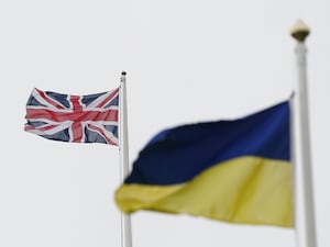 A Ukrainian flag and a Union flag