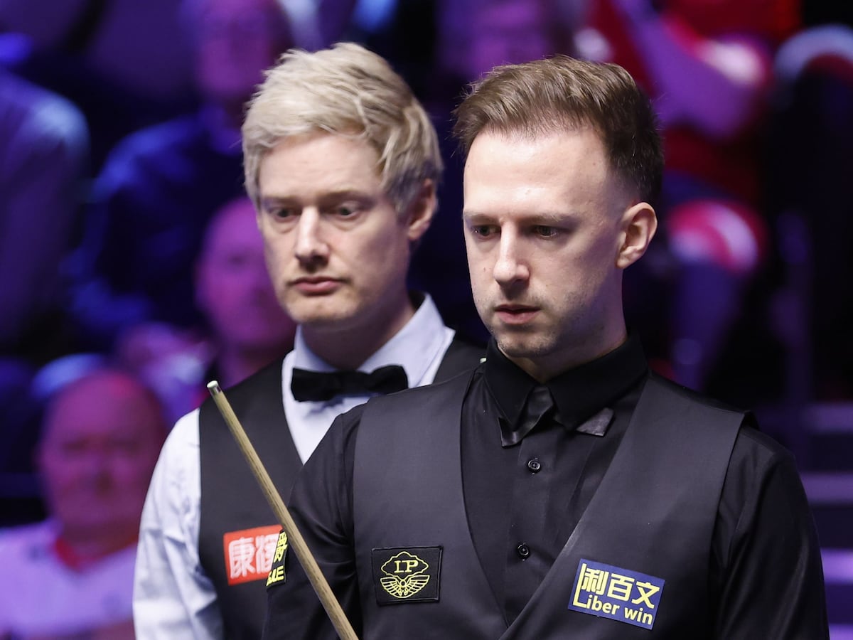 Judd Trump critical of table conditions after reaching last 16 in York