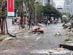 Debris strewn across the streets in the aftermath of an explosion