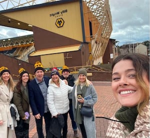 McLoughlin and his family on a visit to Molineux last season to celebrate his 60th birthday for Wolves' clash with Chelsea.