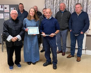 Rebecca Greenham and John Evans receive their Community Awards from Cllr Martin Bennett