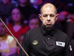 Barry Hawkins in action against Mark Allen