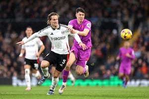  Joachim Andersen of Fulham is challenged by Joergen Strand Larsen of Wolverhampton Wanderers (Photo by Julian Finney/Getty Images)