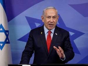 Benjamin Netanyahu gestures as he makes a televised statement