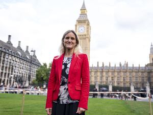 Labour MP Kim Leadbeater standing in front of the Houses of Parliament