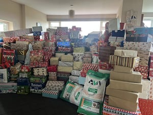 An astonishing amount of presents piled high at Cheryl's home.