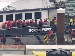 A group of people thought to be migrants are brought in to Dover, Kent, from a Border Force vessel following a small boat incident in the Channel