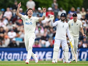 New Zealand’s Matt Henry celebrates after taking the wicket of England’s Zak Crawley