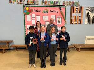 Teacher Gemma Craig at Apley Wood Primary Academy and APCC Steve Mackay alongside pupils from the academy