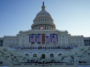 People take their places as a rehearsal begins on the West Front of the US Capitol ahead of president-elect Donald Trump’s upcoming inauguration ceremony