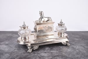 This impressive Victorian Egyptian revival silver desk stand by Horace Woodward is valued at up to £700.