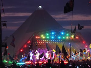 Coldplay performing at Glastonbury Festival