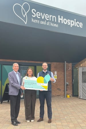 Salop Leisure chairman Tony Bywater (left) and marketing manager Ed Glover present the cheque to Jenny Bean, Severn Hospice corporate fundraiser and events organiser.