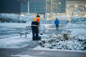 Workers out clearing routes at Telford Town Centre. Picture: Jamie Ricketts