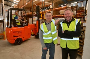 Paul Gatfield (Head of Manufacturing) and Warehouse Manager: Andy Warrilow. In the forklift: Mick Naylor.