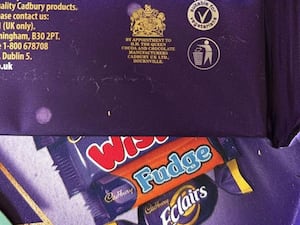 A Cadbury wrapper displaying the royal warrant