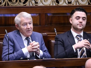 Independent TDs Michael Lowry and Barry Heneghan in the Dail chamber (Maxwells)