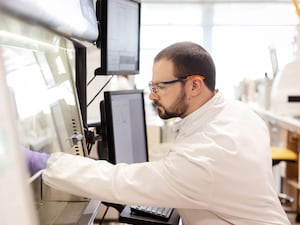 A scientist running testing for GSK