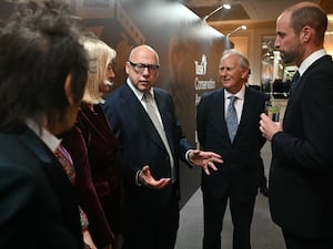 The Prince of Wales meets Ronnie Wood of the Rolling Stones (left) and Dire Straits' Mark Knopfler (centre) ahead of the Tusk Conservation Awards