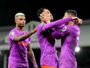 Matheus Cunha (centre) celebrates after scoring for Wolves