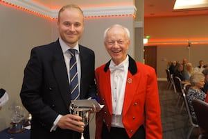 Order of Merit winner Tom Kerr with Shropshire & Herefordshire president Charles Sievewright