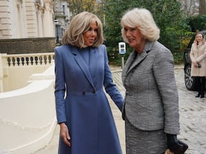 Brigitte Macron greeting the Queen