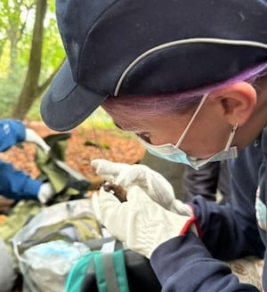 Severn Trent's Charlotte Trigg petting a bat