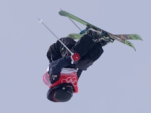 Kirsty Muir upside down in action at Beijing 2022 Winter Olympics