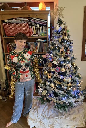 Kathryn enjoying decorating the Christmas tree