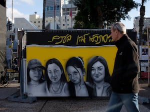 A mural of female Israeli soldiers held hostage by the Hamas militant group in the Gaza Strip is displayed in Tel Aviv, Israel