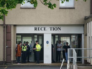 Police presence outside the Cairn Hotel in Bathgate, which is used to house asylum seekers