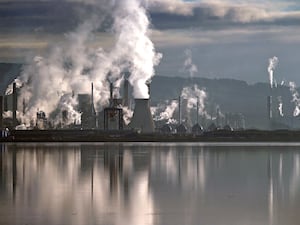 View of the Grangemouth oil refinery from across a river